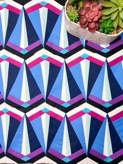 Skye Quilt Pattern - Julia Wachs Designs - A blue and pink Skye quilt.